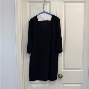 Elegant Black Dress with Flared Sleeves